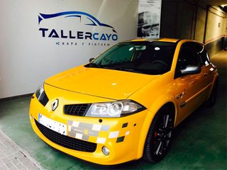 Taller Cayo vehículo amarillo